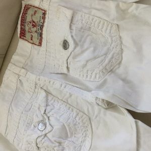 Men’s jeans. White